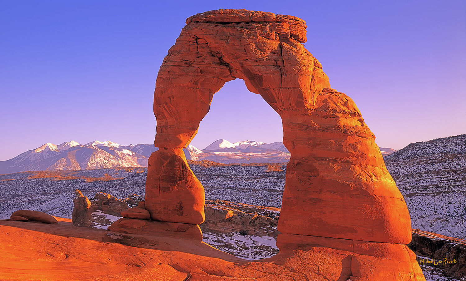 Delicate Arch is a 60' tall, freestanding natural arch located in Arches National Park in Utah. This iconic symbol is one of...