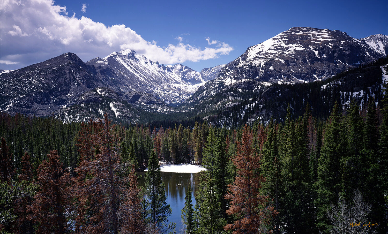 This view high above Nymph Lake in Rocky Mountain National Park shows off the spectacular mountain cirque west of Longs Peak...