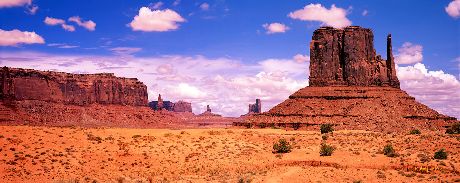 A perfect July afternoon in Monument Valley. The monsoon season cumulus clouds were floating lazily across the desert sky, the...